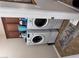 Convenient laundry room with stacked washer and dryer and ample storage space at 6614 Collingsworth St, Las Vegas, NV 89131