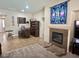 Inviting living room featuring a fireplace and a cozy bar area perfect for entertaining guests at 6614 Collingsworth St, Las Vegas, NV 89131