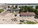 Aerial of estate with workshop, equipment storage, volleyball court, and room to roam at 825 W Ryan Ave, Overton, NV 89040