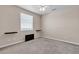 Bedroom featuring a ceiling fan, window, and two built-in shelves at 825 W Ryan Ave, Overton, NV 89040