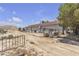 Wide shot of house exterior, showing lot size, construction and space for storage at 825 W Ryan Ave, Overton, NV 89040