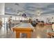 Large game room with bar, multiple ceiling fans, pool table and room for seating at 825 W Ryan Ave, Overton, NV 89040
