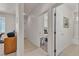 Hallway showcasing tile flooring, and an open doorway to the main bedroom at 825 W Ryan Ave, Overton, NV 89040