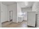 Convenient kitchenette in garage with basic appliances, enhancing functionality at 825 W Ryan Ave, Overton, NV 89040