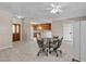 Open living area with tile floors, ceiling fan, and direct kitchen access at 825 W Ryan Ave, Overton, NV 89040