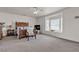 Spacious main bedroom featuring plush carpet, a window seat, and ample natural light at 825 W Ryan Ave, Overton, NV 89040