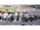 A high-angle view captures a neighborhood with neatly arranged homes and a mix of earth-toned roofs at 8901 Kingswood Dr, Las Vegas, NV 89147