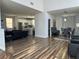 Spacious living room showcasing an open layout with modern furnishings and stylish flooring at 8901 Kingswood Dr, Las Vegas, NV 89147