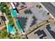 Aerial view of solar panels on the roof with pool and jacuzzi in the backyard at 9015 Chopper Prairie St, Las Vegas, NV 89131