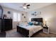 Comfortable bedroom with a large bed, stylish decor, and ample natural light at 9015 Chopper Prairie St, Las Vegas, NV 89131