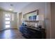 Welcoming foyer featuring stylish console table with lamps and a decorative mirror above at 9015 Chopper Prairie St, Las Vegas, NV 89131