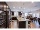 Stylish kitchen with granite countertops, stainless steel appliances, and a breakfast bar with seating at 9015 Chopper Prairie St, Las Vegas, NV 89131