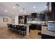 Modern kitchen with a central island, stainless steel appliances, and ample countertop space at 9015 Chopper Prairie St, Las Vegas, NV 89131