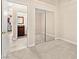 This bedroom has carpet, a closet, and access to a bathroom at 9733 Northern Dancer Dr, Las Vegas, NV 89117