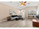 Bright and airy living room with comfortable seating, accent furniture, and lots of natural light at 9733 Northern Dancer Dr, Las Vegas, NV 89117
