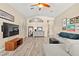 Spacious living room with recessed lights, ceiling fan, and neutral decor at 9733 Northern Dancer Dr, Las Vegas, NV 89117