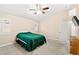 This main bedroom has carpet, a ceiling fan, and a window with blinds at 9733 Northern Dancer Dr, Las Vegas, NV 89117