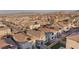 This neighborhood features solar panels, fenced yards, and desert landscaping at 10347 Restless River St, Las Vegas, NV 89141