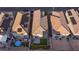 An overhead view of a fenced backyard with patio and solar panels at 10347 Restless River St, Las Vegas, NV 89141