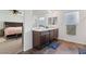 Stylish bathroom featuring a double vanity, tile floor and a shower stall at 10347 Restless River St, Las Vegas, NV 89141