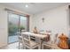 Dining room with sliding glass doors leading to the backyard patio area at 10347 Restless River St, Las Vegas, NV 89141