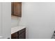 Laundry area features a countertop, cabinets, and a modern washer/dryer set at 10347 Restless River St, Las Vegas, NV 89141