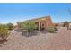 Wide backyard view highlighting the covered patio and low-maintenance landscaping at 10428 Villa Ridge Dr, Las Vegas, NV 89134