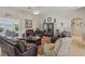 Cozy living room with leather furniture and decorative accents at 10428 Villa Ridge Dr, Las Vegas, NV 89134