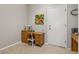 An office with a wooden desk and a filing cabinet at 10428 Villa Ridge Dr, Las Vegas, NV 89134
