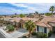 View of the Arbor Grove community, showcasing single-story homes, well-manicured yards, and the Las Vegas skyline at 10513 Shanna Trellis Ave, Las Vegas, NV 89144