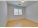 Bedroom with hardwood floors and wood shutter blinds at 10513 Shanna Trellis Ave, Las Vegas, NV 89144