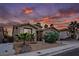 Beautiful single-story home featuring drought resistant landscaping, neutral paint, and two-car garage at 10513 Shanna Trellis Ave, Las Vegas, NV 89144