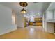 Open view of the kitchen from the living area with stainless steel appliances at 10513 Shanna Trellis Ave, Las Vegas, NV 89144