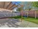 Beautiful backyard featuring artificial grass, playground, and covered patio for outdoor enjoyment at 1069 Aspen Cliff Dr, Henderson, NV 89011