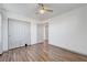 Bedroom featuring wood-look floors, closet, and neutral paint at 1069 Aspen Cliff Dr, Henderson, NV 89011