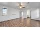 Large bedroom with wood floors, a ceiling fan and bright natural light at 1069 Aspen Cliff Dr, Henderson, NV 89011