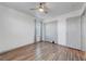 Bedroom featuring wood-look floors, closet, and neutral paint at 1069 Aspen Cliff Dr, Henderson, NV 89011