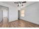 Bedroom featuring wood-look floors, ceiling fan, and neutral paint at 1069 Aspen Cliff Dr, Henderson, NV 89011