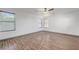 Spacious bedroom with wood floors, neutral walls and lots of natural light at 1069 Aspen Cliff Dr, Henderson, NV 89011