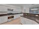 Updated kitchen features stainless steel appliances, stylish countertops, and ample storage at 1069 Aspen Cliff Dr, Henderson, NV 89011