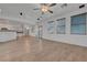 Open-concept living area with hardwood floors seamlessly connects to the kitchen, great for entertaining guests at 1069 Aspen Cliff Dr, Henderson, NV 89011