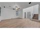 Bright open-concept living area featuring hardwood floors and a modern staircase at 1069 Aspen Cliff Dr, Henderson, NV 89011