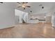 Open-concept living area with hardwood floors seamlessly connects to the kitchen, great for entertaining guests at 1069 Aspen Cliff Dr, Henderson, NV 89011