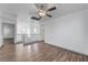 Bright open loft space with wood floors and modern ceiling fan fixture at 1069 Aspen Cliff Dr, Henderson, NV 89011