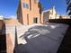 Large backyard featuring a cement patio and privacy fence at 1333 Pacific Terrace Dr, Las Vegas, NV 89128