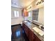 Bathroom features a long granite vanity and a tub/shower combination at 1333 Pacific Terrace Dr, Las Vegas, NV 89128