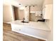 Well-lit kitchen featuring stone countertops and stainless steel appliances at 1333 Pacific Terrace Dr, Las Vegas, NV 89128