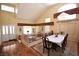 Bright dining room featuring soaring ceilings and ample natural light at 1700 Double Arrow Pl, Las Vegas, NV 89128