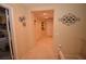 Upstairs hallway that has neutral decor and ample lighting at 1700 Double Arrow Pl, Las Vegas, NV 89128