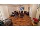 Cozy living room with a fireplace, ceiling fan, and sliding doors at 1700 Double Arrow Pl, Las Vegas, NV 89128